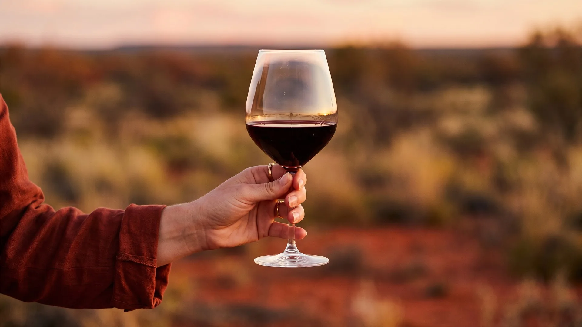 A glass of wine at camp