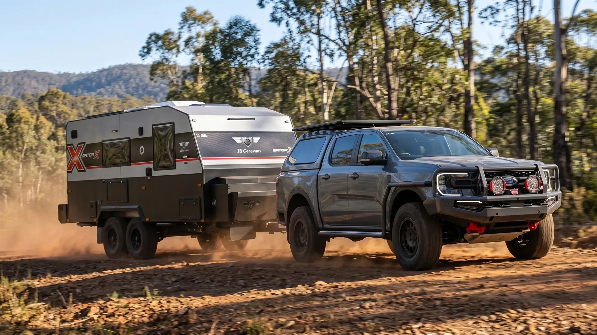 A family on the road in a JB caravan